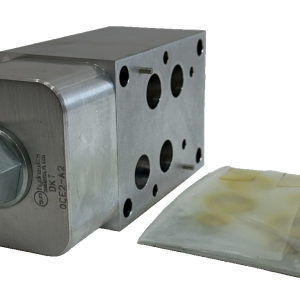 NEW SUN HYDRAULICS DKT MANIFOLD VALVE BLOCK OCE2-A2